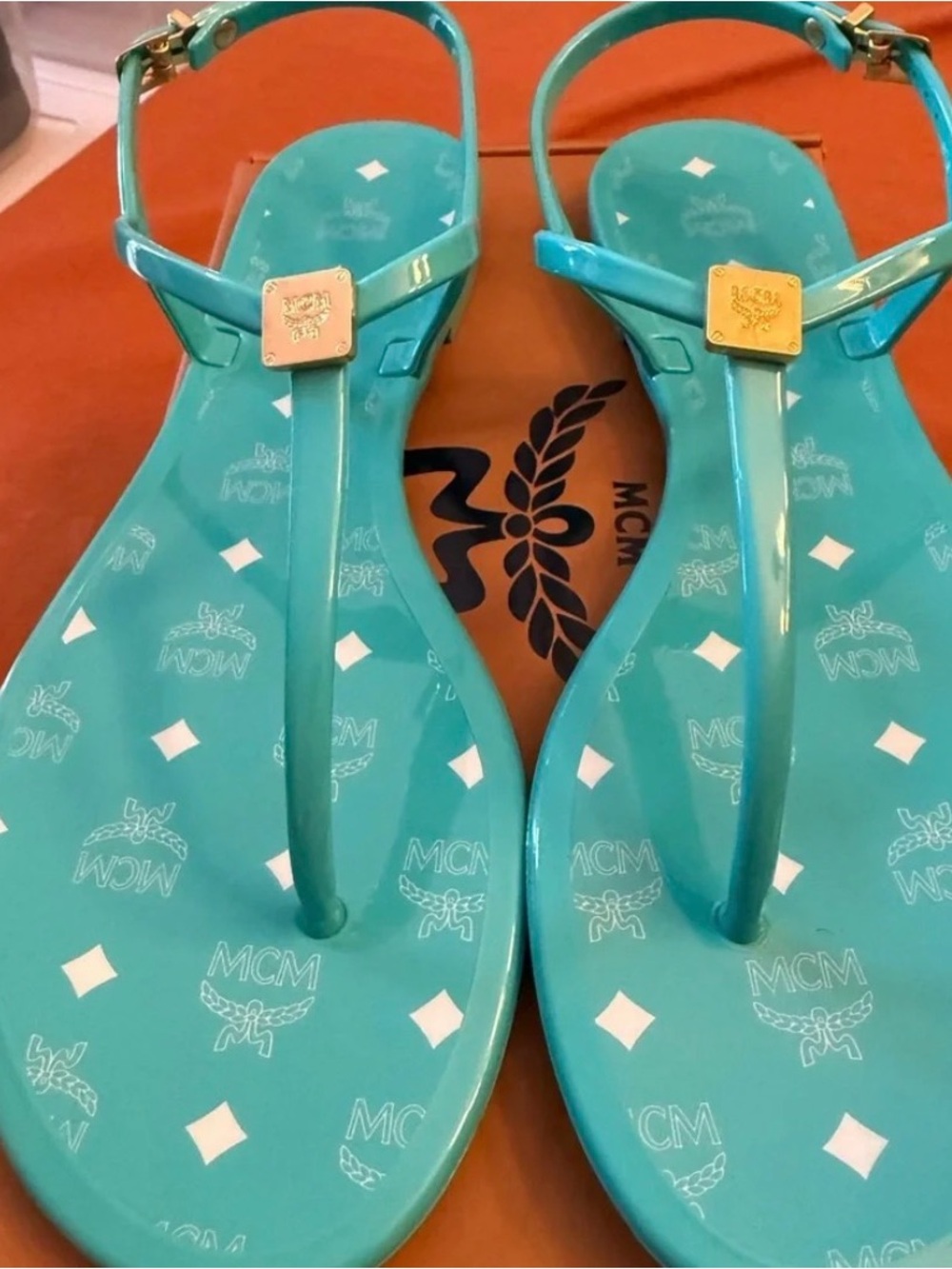 MCM Turquoise Logo Jelly T-Strap Sandals with Gold Accents